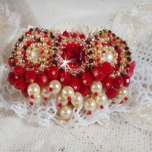 Ruby brooch embroidered with a 1960's bohemian glass cabochon, pearls, Swarovski crystals and seed beads